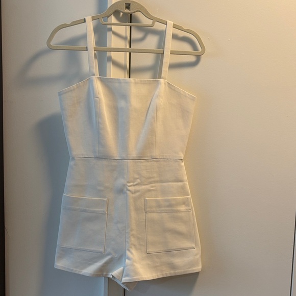 Alexis White Sleeveless Romper - Picture 1 of 11